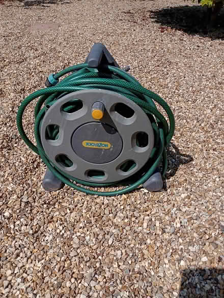 Photo of free Hose pipe + reel (Pebsham TN40) #1