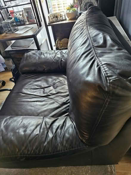 Photo of free Brown leather arm chair (St. Georges TF2) #2