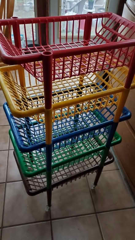 Photo of free Stack of rainbow baskets on wheels (Groton (north)) #1
