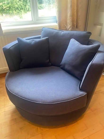 Photo of free Blue cuddle swivel chair from DFS (Letchworth SG6) #2