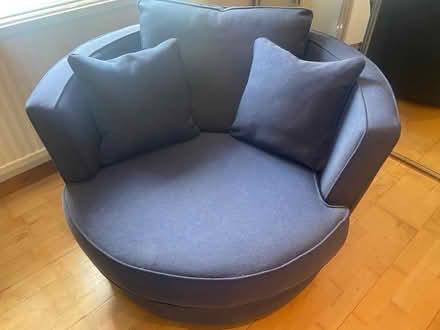 Photo of free Blue cuddle swivel chair from DFS (Letchworth SG6) #1