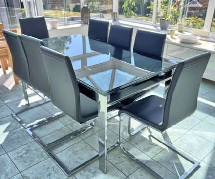 Photo of free Black glass & chrome extending table & 8 chairs, John Lewis (Salvington BN14) #1
