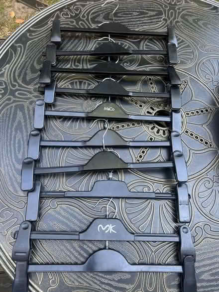 Photo of free 10 Black Plastic Hangers, with Clips for Trousers or Skirts (Surbiton KT6) #1