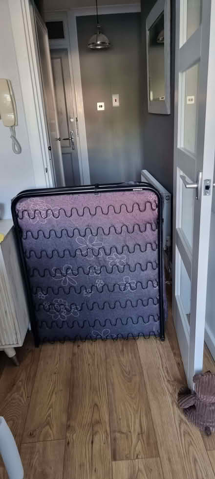 Photo of free Metal Folding Bed And 2 Clean Folding Mattresses (CT14) #1