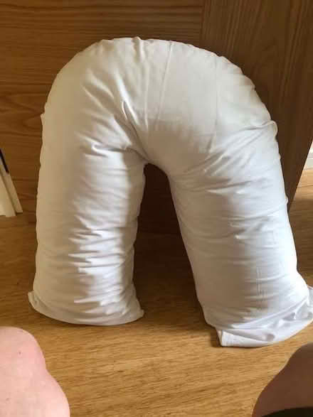 Photo of free V-shaped pillow, new (Stoke St Milborough SY8) #1