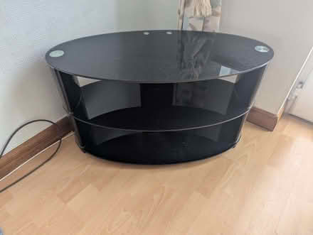 Photo of free Black glass TV stand (Rainhill L35) #1