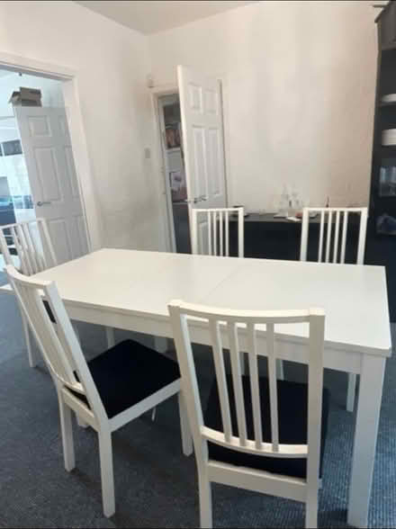 Photo of free IKEA extendable table and 6 chairs (Prestwich M25) #1