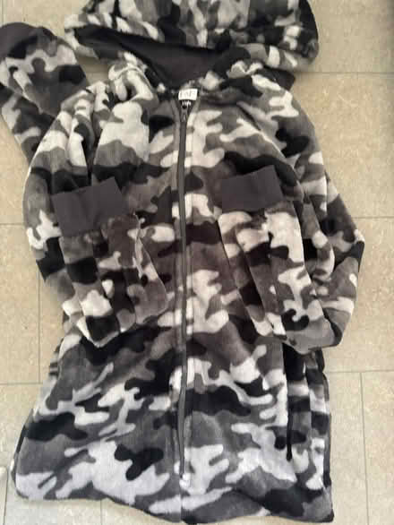 Photo of free Onesie age 9-10 small hole (GL3) #1