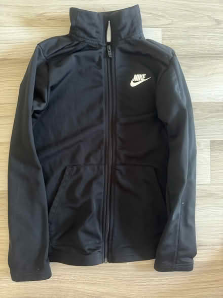 Photo of free Nike age 10-11 black zip up jacket (GL3) #1