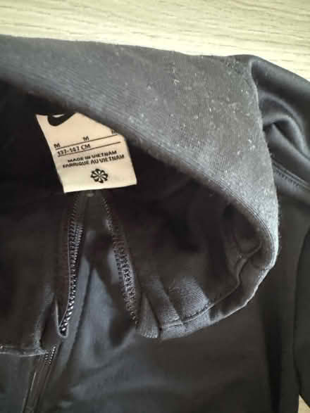 Photo of free Nike age 10-11 black zip up jacket (GL3) #2