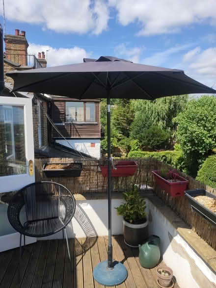 Photo of free 2m diameter parasol with tilting crank and base (Muswell Hill N10) #1