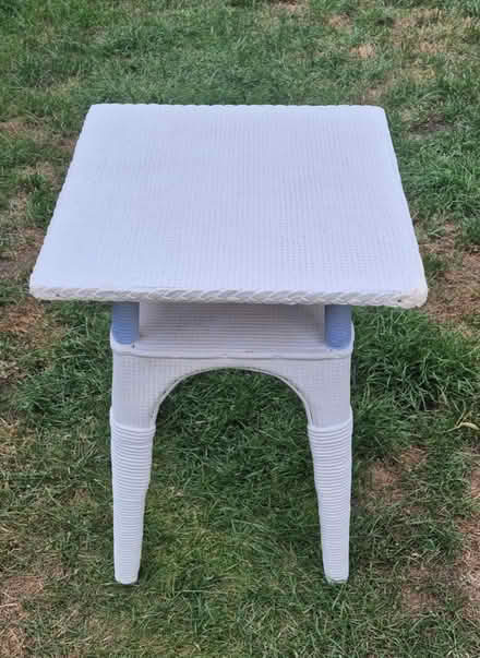 Photo of free Small white table 25 inches high (Guildford) #1