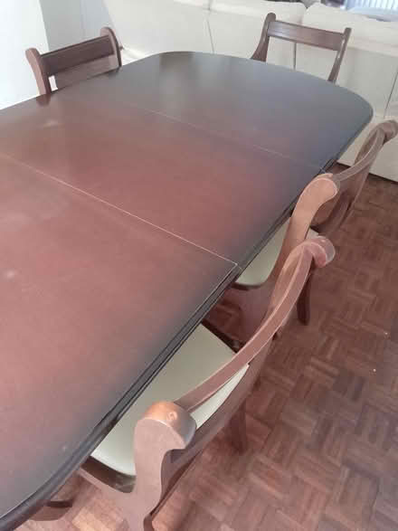 Photo of free Dark wood dining table and 6 chairs (Highcliffe, BH23 5DH) #3