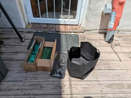 Photo of free 2x grow bags, stakes, netting (Logan Circle) #2