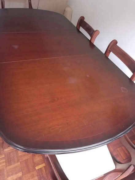 Photo of free Dark wood dining table and 6 chairs (Highcliffe, BH23 5DH) #1