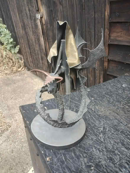 Photo of free Rider and dragon metal sculpture (Orwell SG8) #1