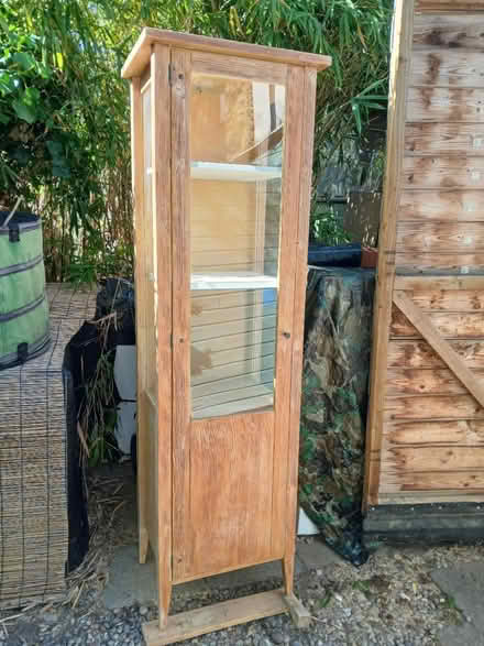 Photo of free Tall glass fronted cabinet (TW12) #1