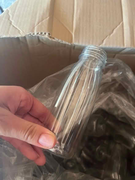 Photo of free Plastic bottles no lids (Weston) #1