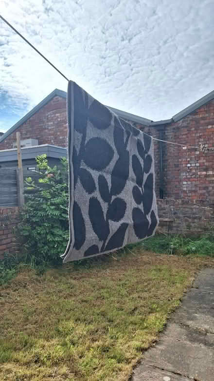 Photo of free 95cm x 130cm grey rug (BS3) #1