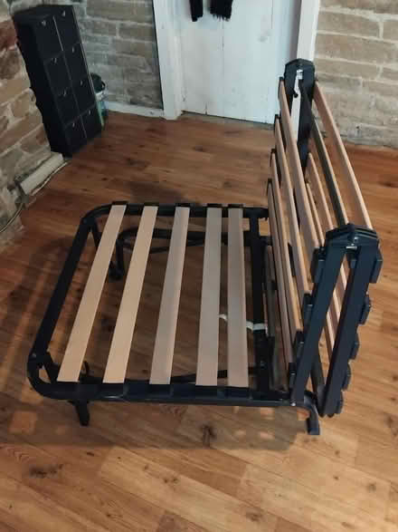 Photo of free IKEA Lykselle chair bed frame (BD9) #1