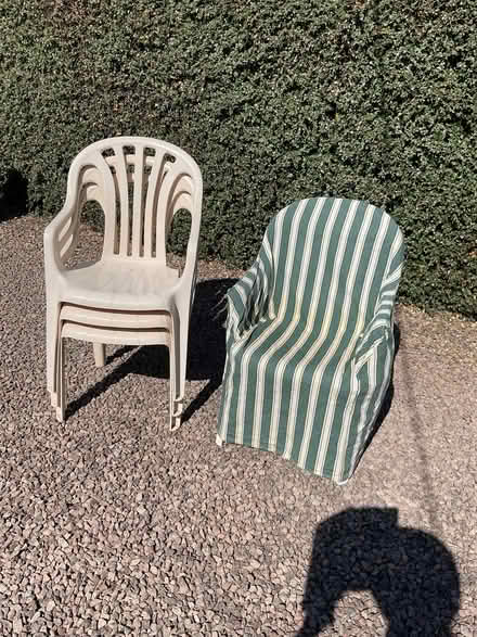 Photo of free Four plastic garden chairs and four loose covers. (Drugger's End WR13) #1