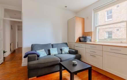 Photo of free Three seater sofa (Clapham North) (Sw4 8du) #1