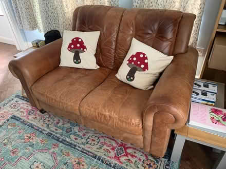 Photo of free Leather 2 seater sofa & footstool (Pipe Aston SY8) #1