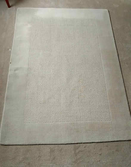 Photo of free Large cream woollen rug (Leek ST13) #1