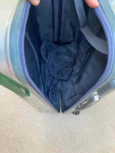 Photo of free Silver 4 wheel suitcase. Superficial defect to outside (Southfields SW18) #4