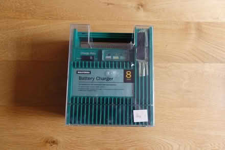 Photo of free Battery charger and discs (L37) #2