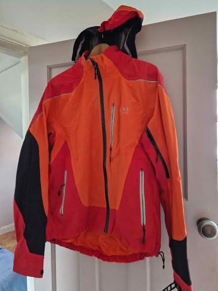 Photo of free Orange/red cycling jacket. (Upper Weston) #1