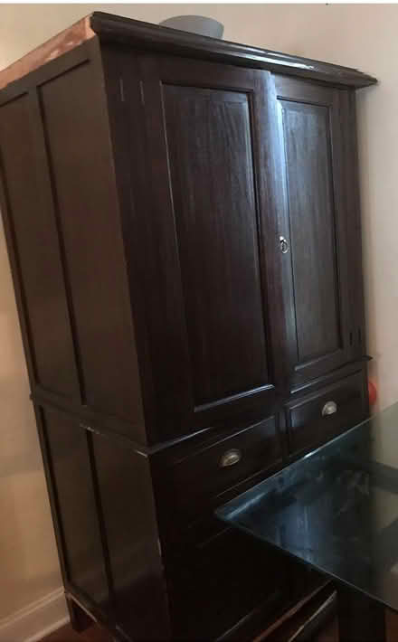 Photo of free Brown wooden tv cabinet (Washington DC) #3