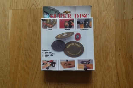 Photo of free Battery charger and discs (L37) #1