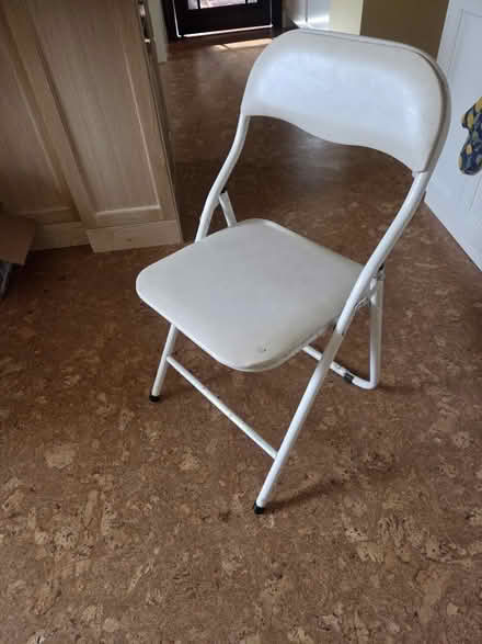 Photo of free 2 white folding chairs (Upper West Side, 108/Broadway) #1