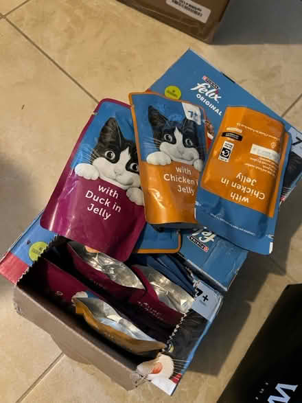 Photo of free Cat food wet + some dried kibbles (SW8) #2