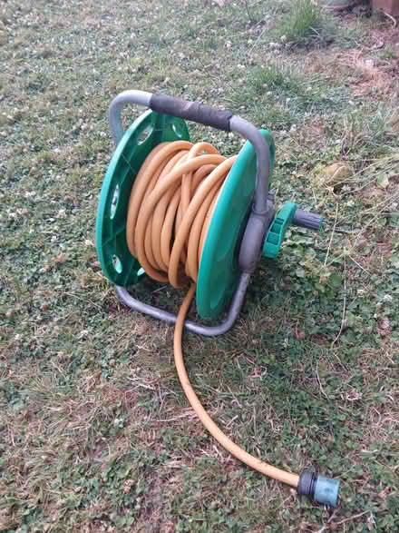 Photo of free Hose with reel (Borehamwood WD6) #1