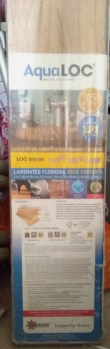 Photo of free Aqua-Loc Laminated Flooring + 6 wider vinyl planks (Bath) #1