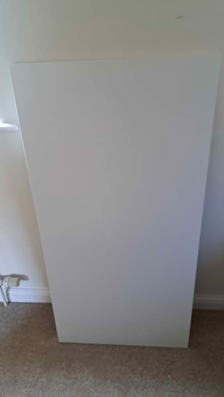 Photo of free White Ikea tabletop (CB2) #1