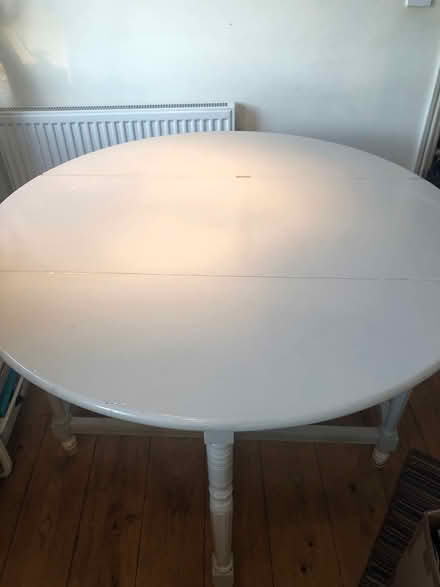 Photo of free Drop leaf wooden dining table (Mortlake Station) #2