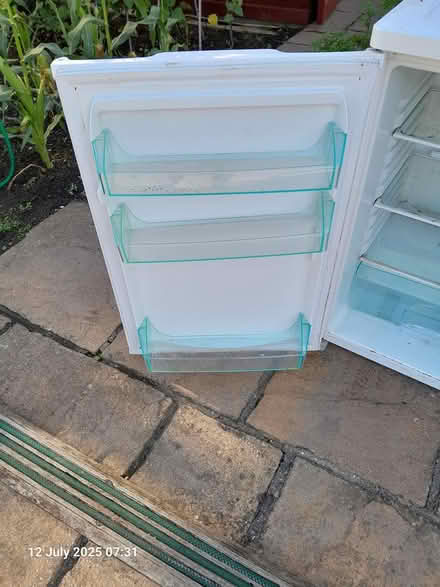 Photo of free Fridge shelves and door inserts (SS8, Canvey Island) #2