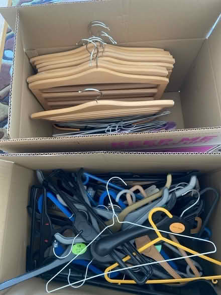 Photo of free Boxes of hangers including wooden trouser hangers (St Margarets TW1) #1