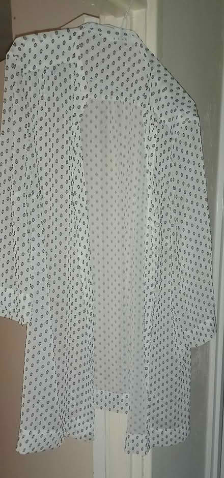 Photo of free 3 women's tops & one skirt (GU21 St. John's, Woking) #1