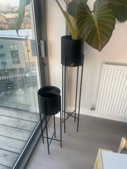 Photo of free Two black plant stands and pots (E14) #1