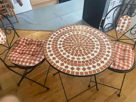 Photo of free Circular black metal mosaic table with 2 matching chairs (Penrith CA11) #1