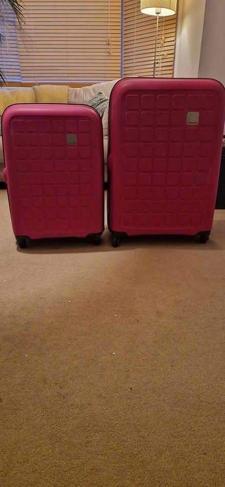 Photo of free 2 large suitcases for storage (TN40 chantry Bexhill) #1