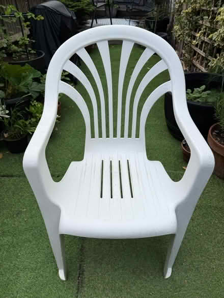Photo of free Single white plastic garden chair (SW18) #1