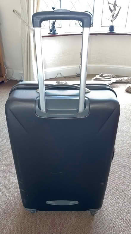 Photo of free Hard shell suitcase on castors with pulley handle. (Welling DA16) #1