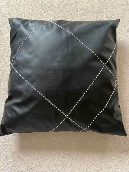 Photo of free Black faux leather cushion. (Swindon SN3) #1