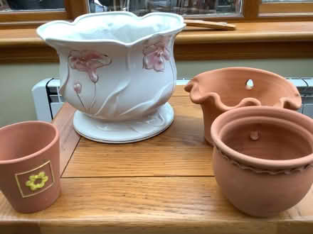 Photo of free 1 large white plant pot holder and 3 terracotta pots (Deanburn EH26) #1