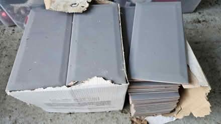 Photo of free 74x Grey tiles (Ash, GU12) #1